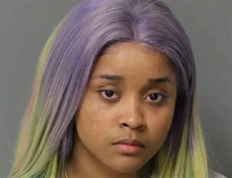 stunna girl putting someone in a cage|Stunna Girl Mugshot